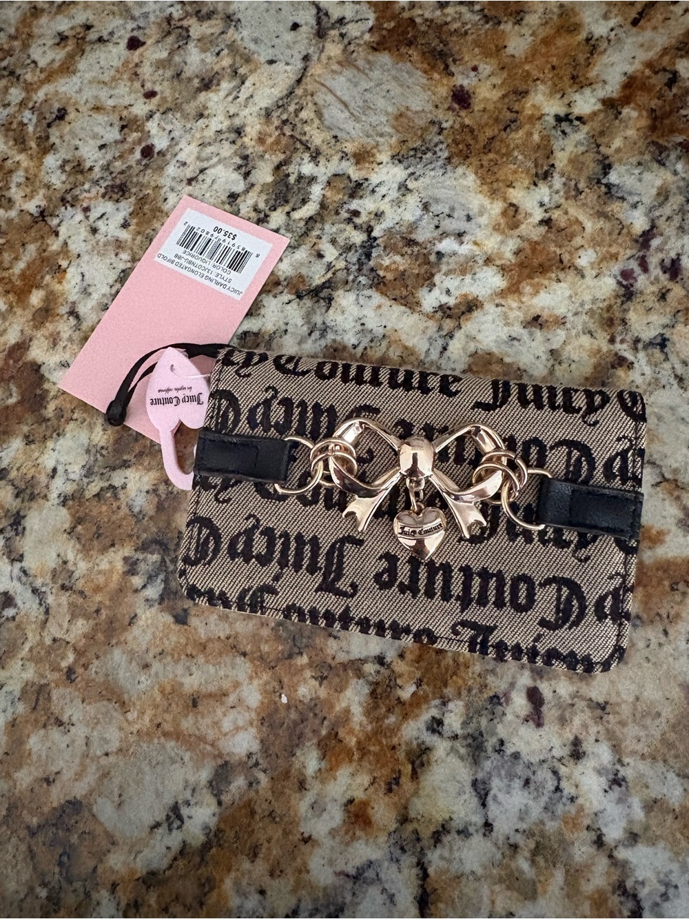 Juicy Couture Beige and Black Logo Wristlet with Gold Bow Hardware